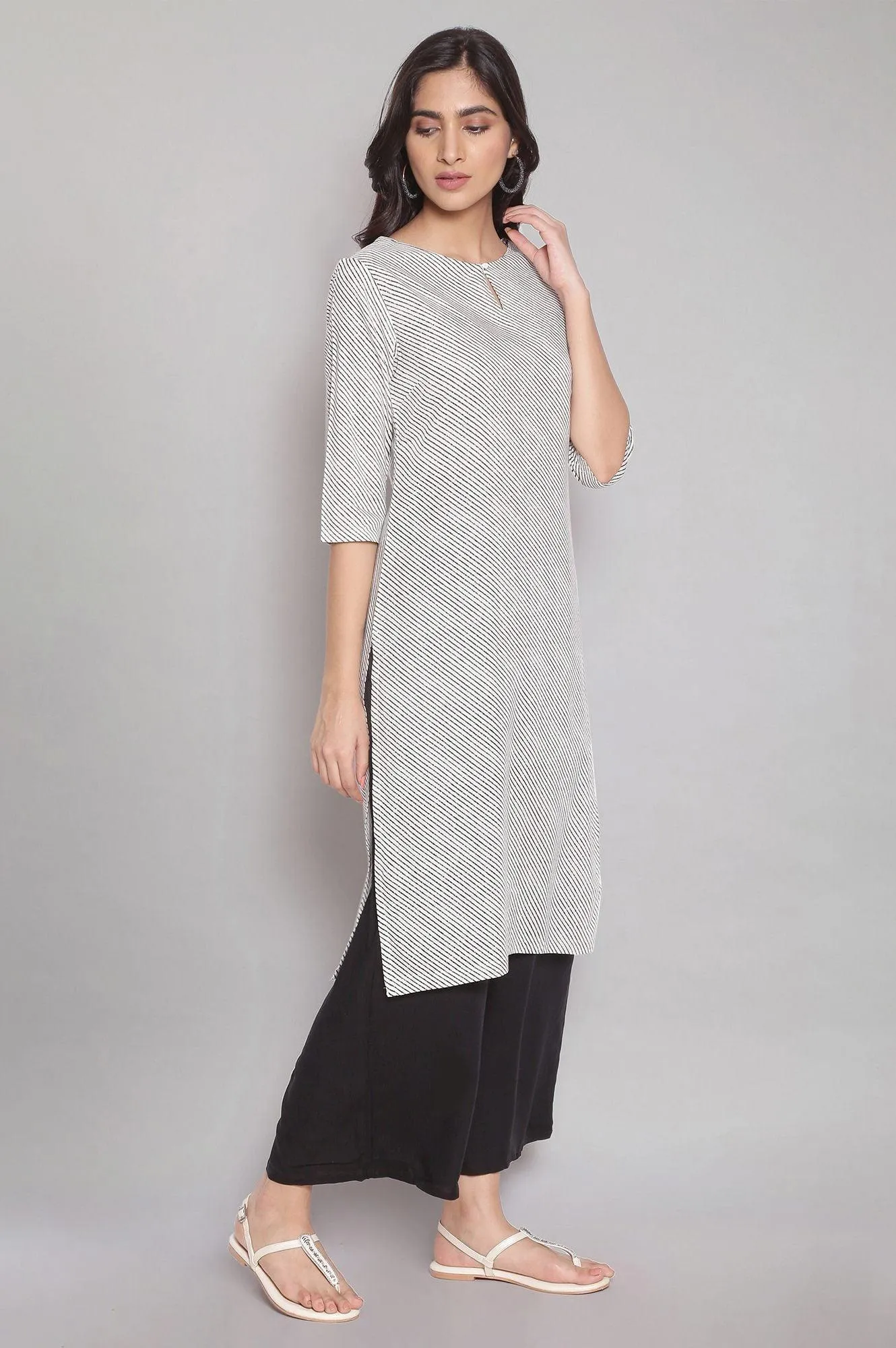 Ecru Stripe Printed kurta With Black Parallel Pants