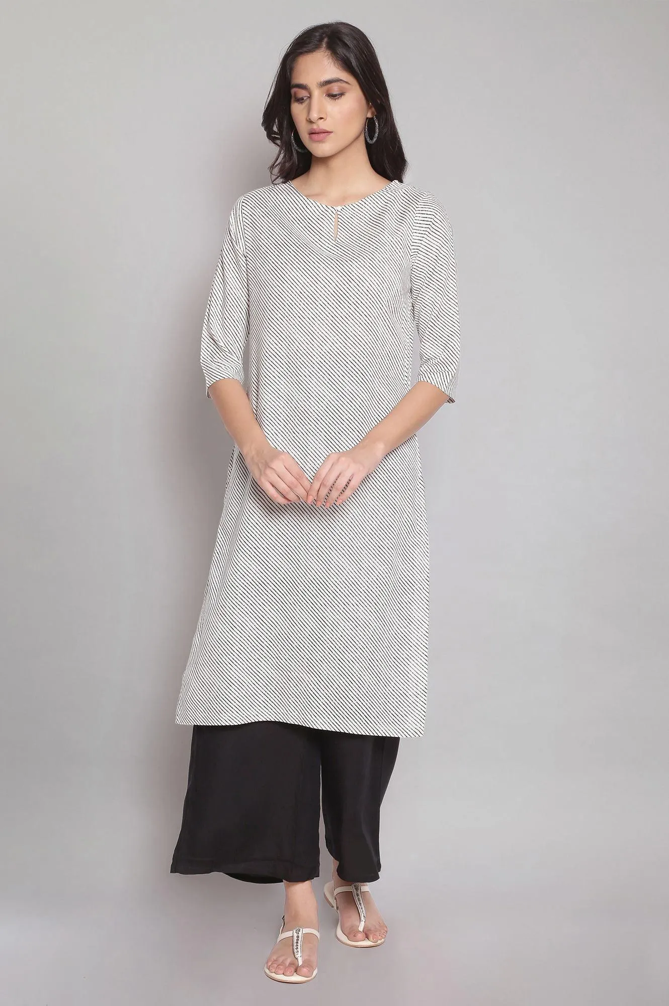 Ecru Stripe Printed kurta With Black Parallel Pants